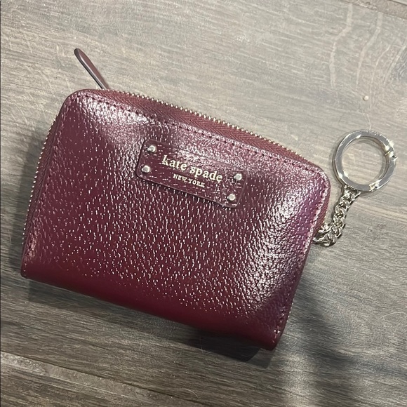 kate spade Handbags - NWT Kate Spade Plum Leather Coin Purse
